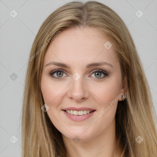 Joyful white young-adult female with long  brown hair and green eyes