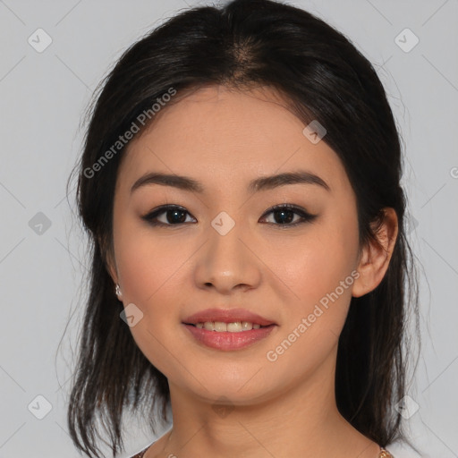 Joyful asian young-adult female with medium  brown hair and brown eyes