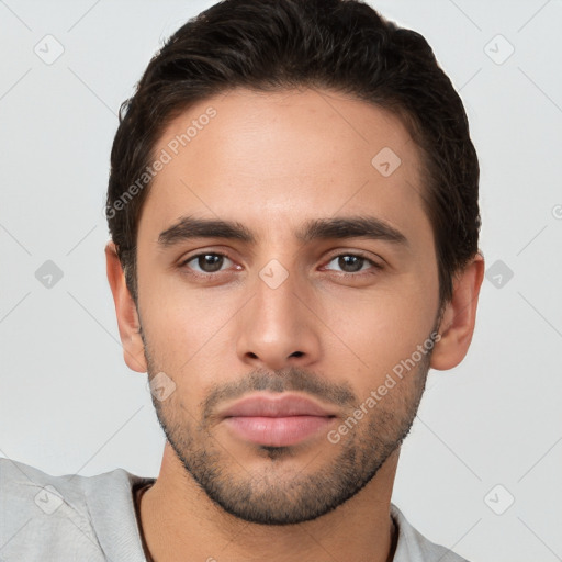 Neutral white young-adult male with short  brown hair and brown eyes