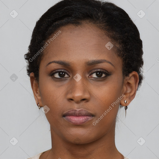 Neutral black young-adult female with short  brown hair and brown eyes