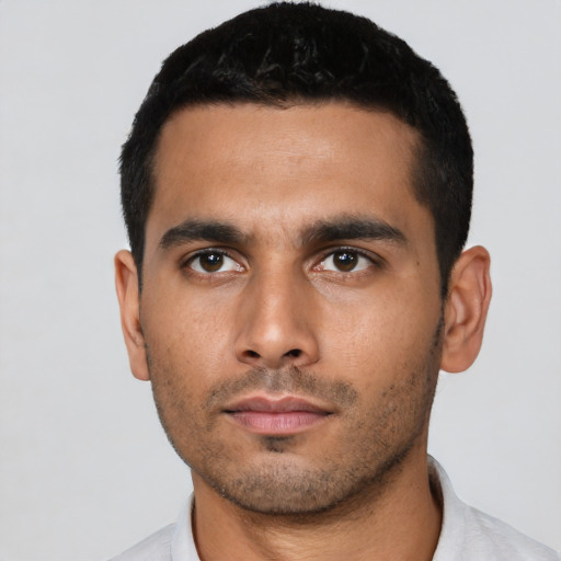 Neutral latino young-adult male with short  black hair and brown eyes
