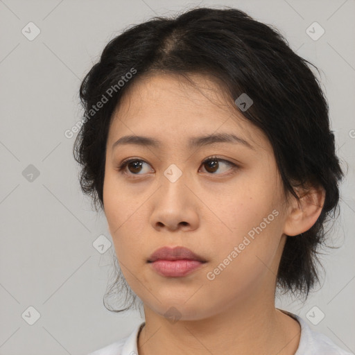 Neutral asian young-adult female with medium  brown hair and brown eyes