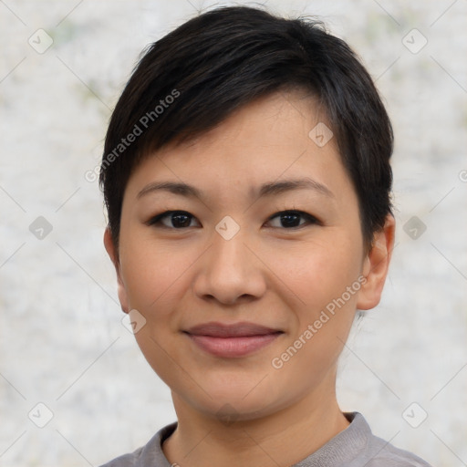 Joyful asian young-adult female with short  black hair and brown eyes