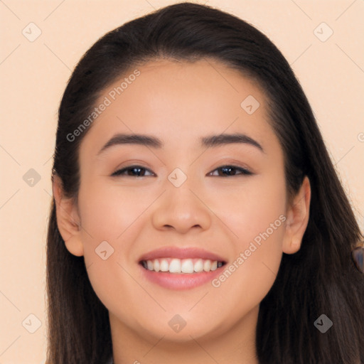 Joyful white young-adult female with long  black hair and brown eyes