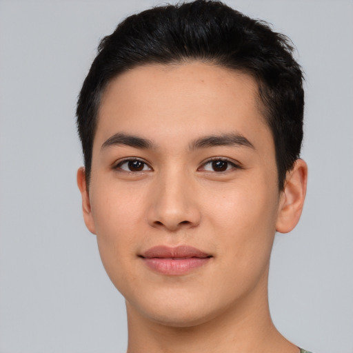 Joyful asian young-adult male with short  black hair and brown eyes