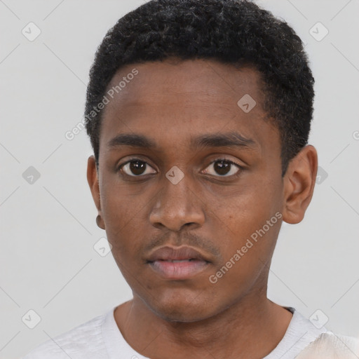 Neutral black young-adult male with short  black hair and brown eyes