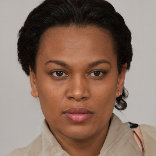 Neutral black young-adult female with short  brown hair and brown eyes