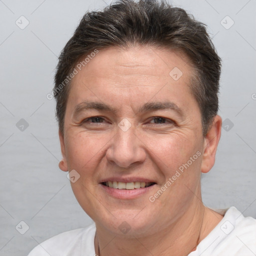 Joyful white adult female with short  brown hair and brown eyes