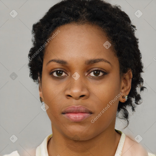 Neutral black young-adult female with short  brown hair and brown eyes