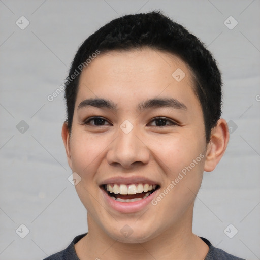 Joyful latino young-adult male with short  black hair and brown eyes