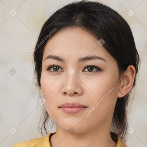 Joyful asian young-adult female with medium  brown hair and brown eyes