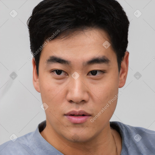 Neutral asian young-adult male with short  black hair and brown eyes