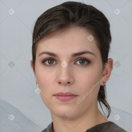 Neutral white young-adult female with medium  brown hair and brown eyes