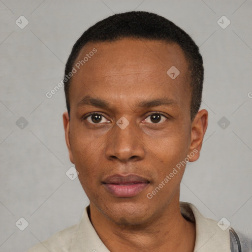Neutral black adult male with short  black hair and brown eyes