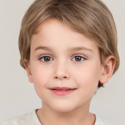 Joyful white child female with short  brown hair and grey eyes