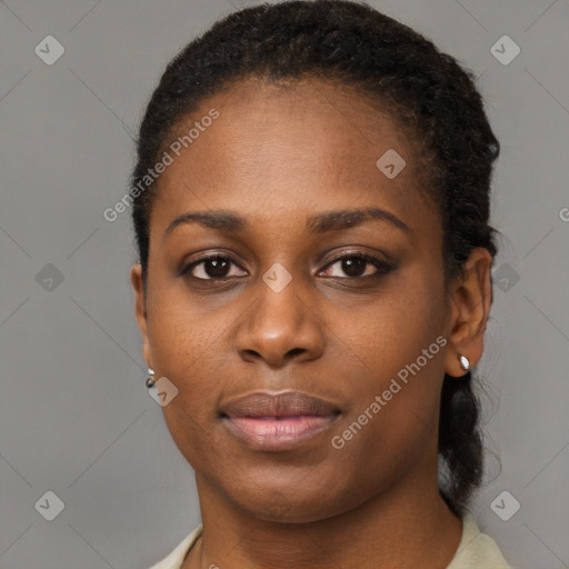 Joyful black young-adult female with short  brown hair and brown eyes