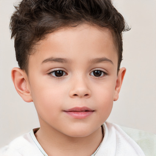 Joyful white child male with short  brown hair and brown eyes