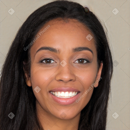 Joyful latino young-adult female with long  brown hair and brown eyes