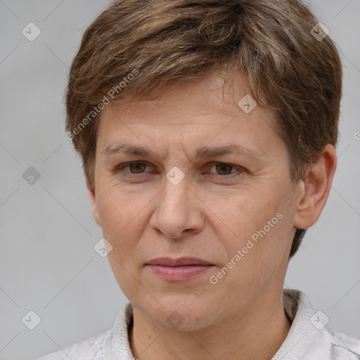 Joyful white adult female with short  brown hair and brown eyes