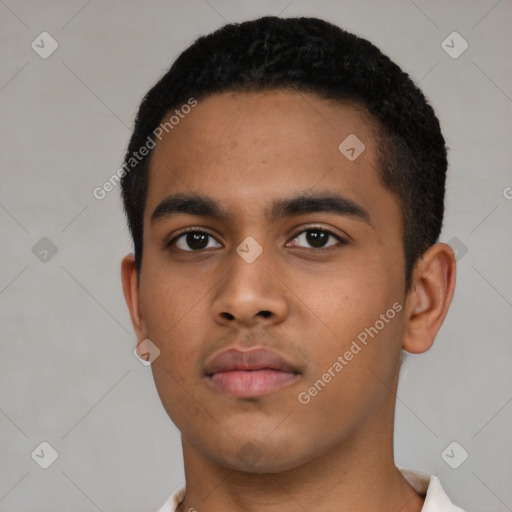 Neutral latino young-adult male with short  black hair and brown eyes