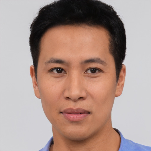 Neutral asian young-adult male with short  black hair and brown eyes
