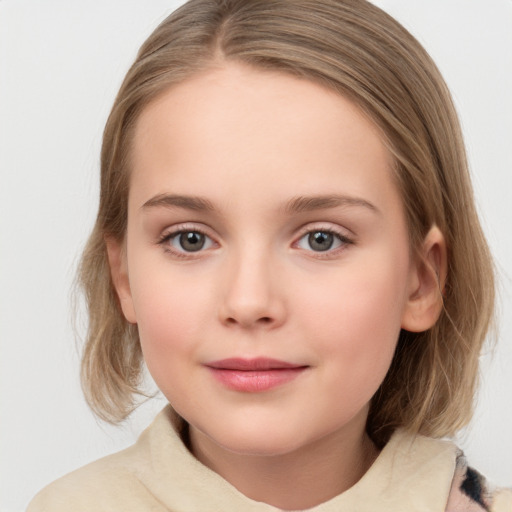 Joyful white child female with medium  brown hair and grey eyes