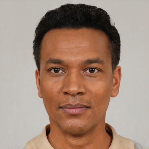 Neutral latino adult male with short  black hair and brown eyes