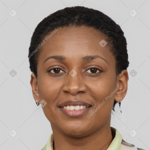 Joyful black young-adult female with short  brown hair and brown eyes