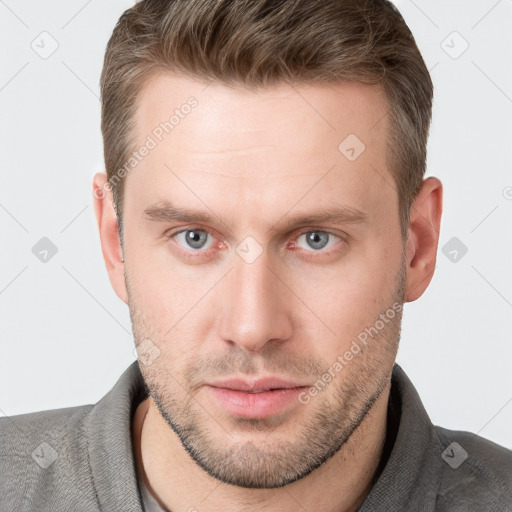 Neutral white young-adult male with short  brown hair and grey eyes