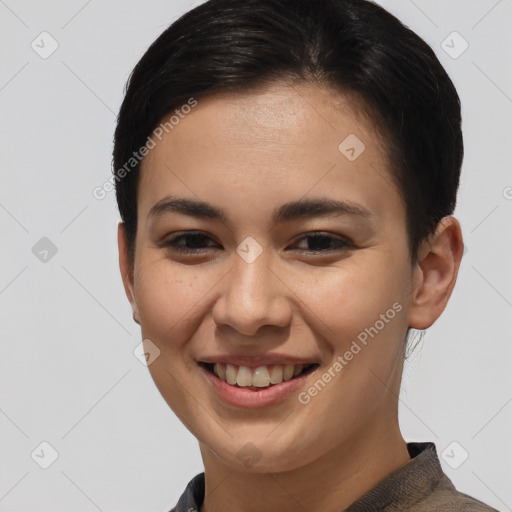 Joyful white young-adult female with short  brown hair and brown eyes