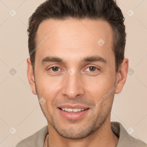 Joyful white young-adult male with short  brown hair and brown eyes