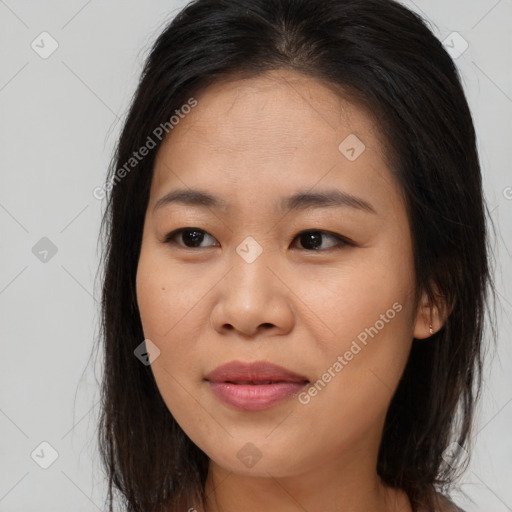 Joyful asian young-adult female with long  brown hair and brown eyes