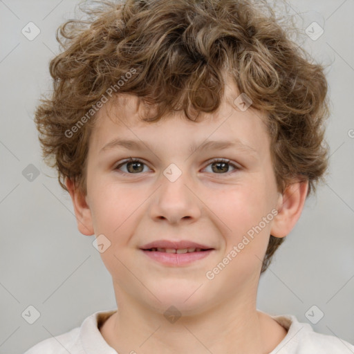 Joyful white child male with short  brown hair and brown eyes