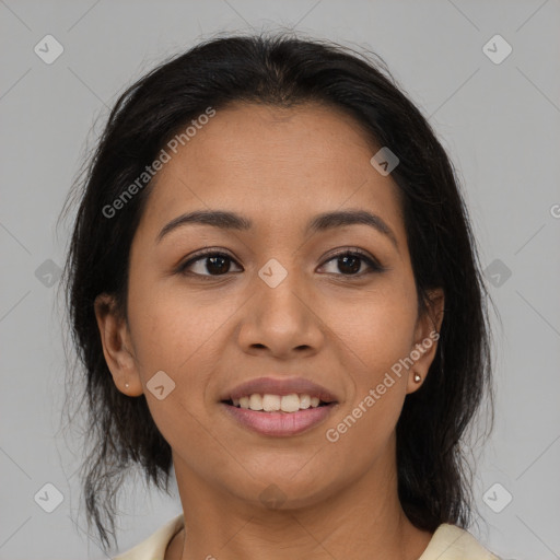 Joyful latino young-adult female with medium  brown hair and brown eyes