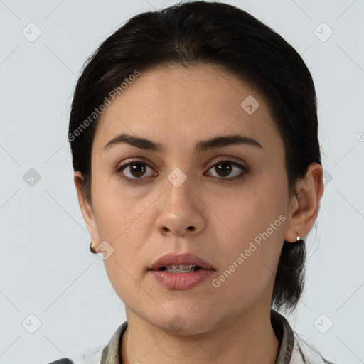 Neutral white young-adult female with medium  brown hair and brown eyes