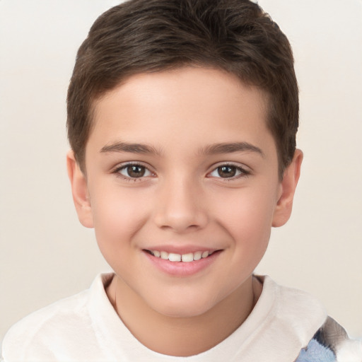 Joyful white child male with short  brown hair and brown eyes