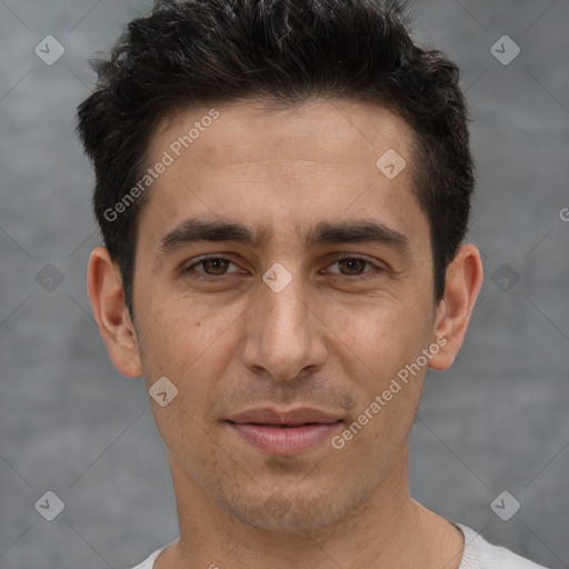 Joyful white adult male with short  brown hair and brown eyes