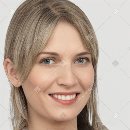 Joyful white young-adult female with long  brown hair and grey eyes