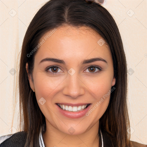 Joyful white young-adult female with long  brown hair and brown eyes