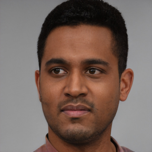 Neutral black young-adult male with short  black hair and brown eyes