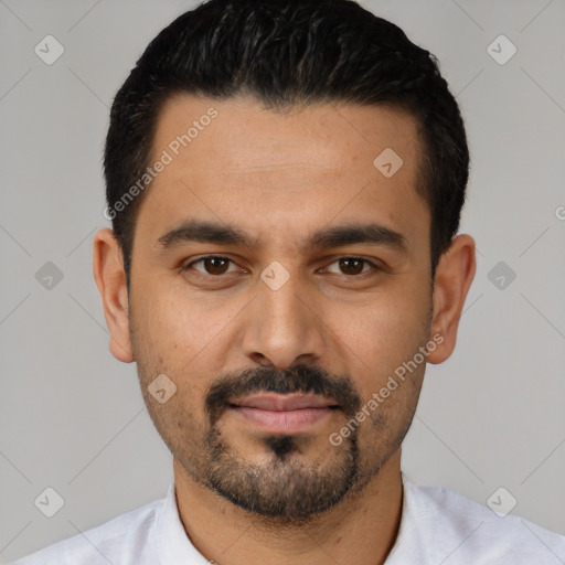 Joyful latino young-adult male with short  black hair and brown eyes