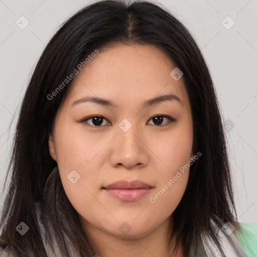 Joyful asian young-adult female with long  brown hair and brown eyes