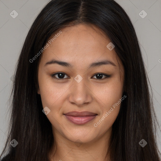 Joyful latino young-adult female with long  brown hair and brown eyes