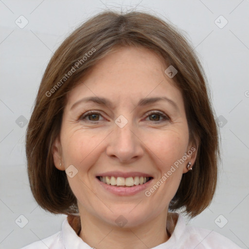 Joyful white adult female with medium  brown hair and brown eyes