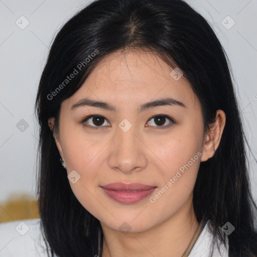 Joyful asian young-adult female with long  brown hair and brown eyes