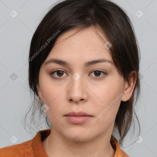 Neutral white young-adult female with medium  brown hair and brown eyes