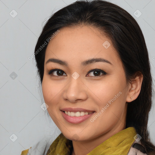 Joyful asian young-adult female with medium  brown hair and brown eyes