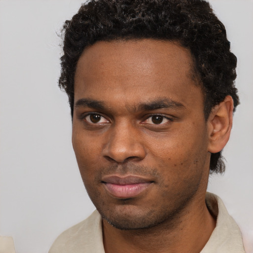 Neutral black young-adult male with short  brown hair and brown eyes