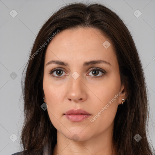 Neutral white young-adult female with long  brown hair and brown eyes