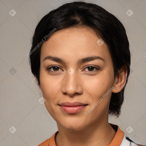 Joyful latino young-adult female with medium  black hair and brown eyes